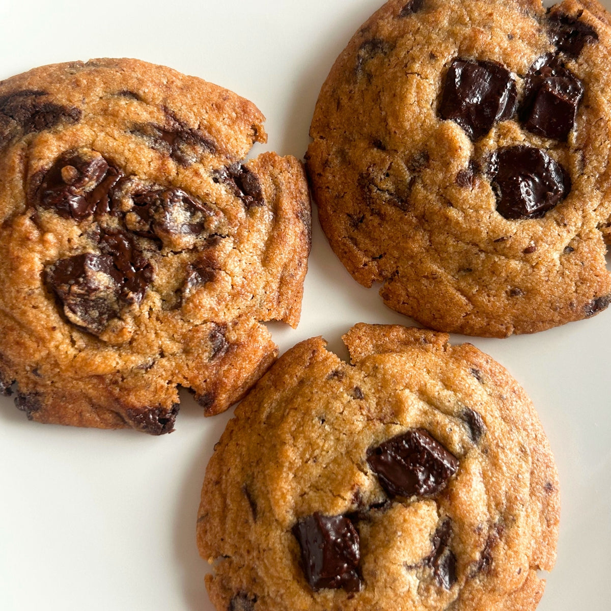 Triple chocolate chunk cookies from Queen Cookies India – premium eggless cookies with gooey chocolate, freshly baked and delivered across India