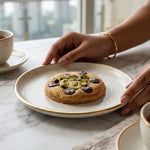 Pistachio Royale gourmet cookie served with coffee, handcrafted eggless pistachio chocolate chip cookie by Queen Cookies