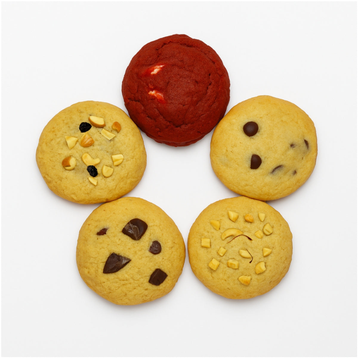 Assorted handcrafted eggless cookies by Queen Cookies India, featuring red velvet, chocolate chunk, dry fruit, saffron pistachio, and choco chip varieties — perfect for premium gifting and nationwide delivery from queencookies.in